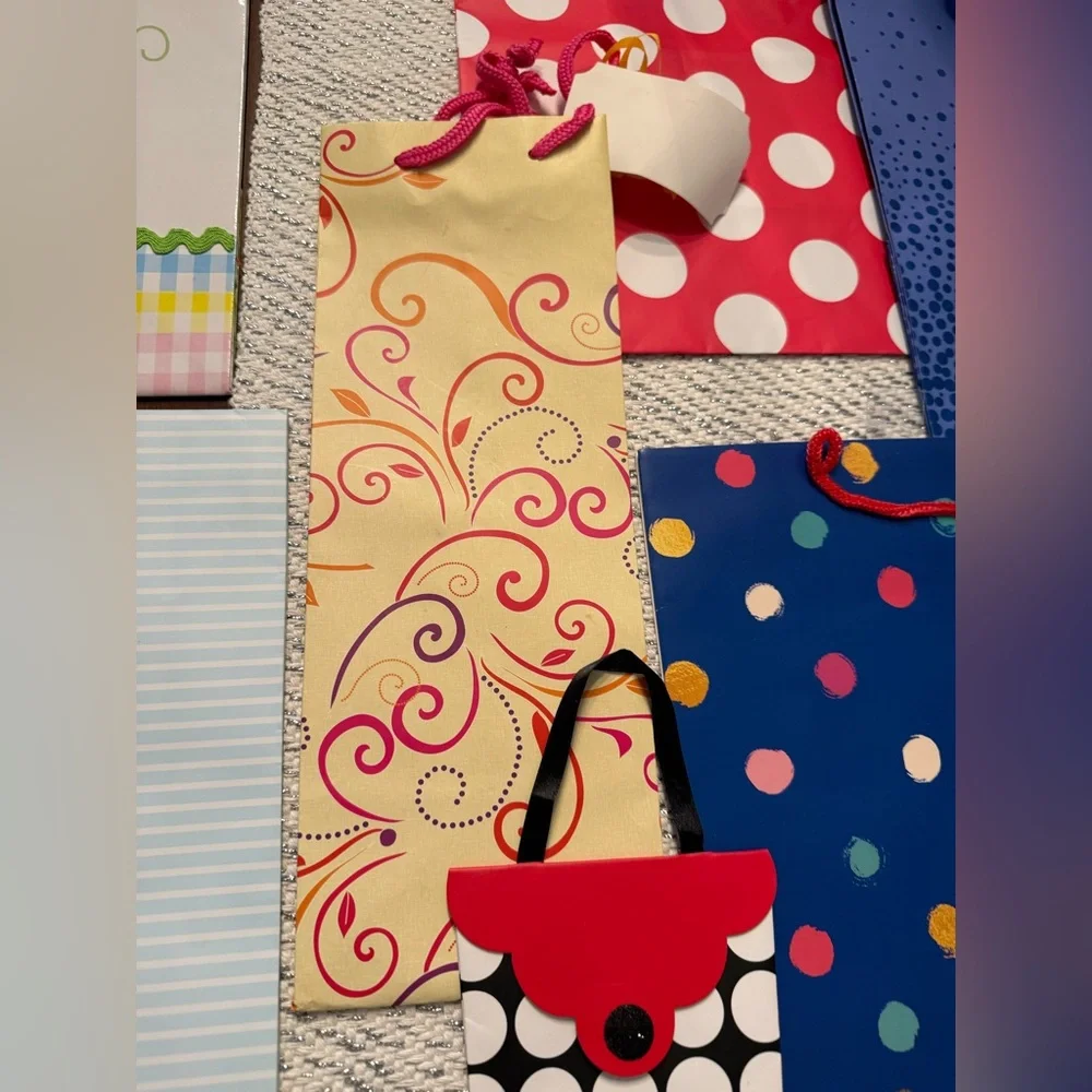 Set of 11 Colorful Gift Bags Set assorted styles and sizes. Total 11 bags
